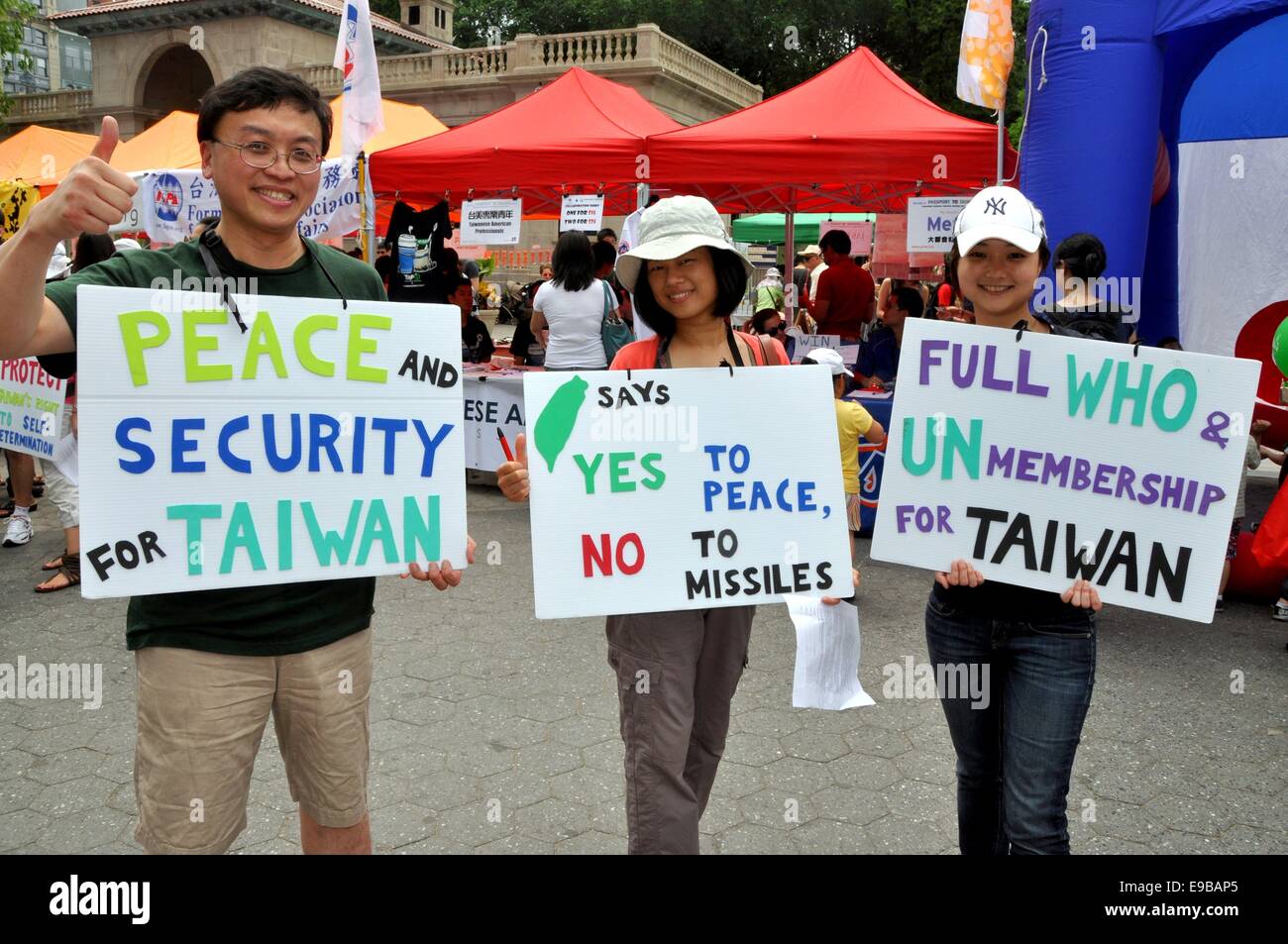 NYC:  Taiwanese holding signs demanding peace and security for Taiwan at the Passport to Taiwan Festival in Union Square Stock Photo