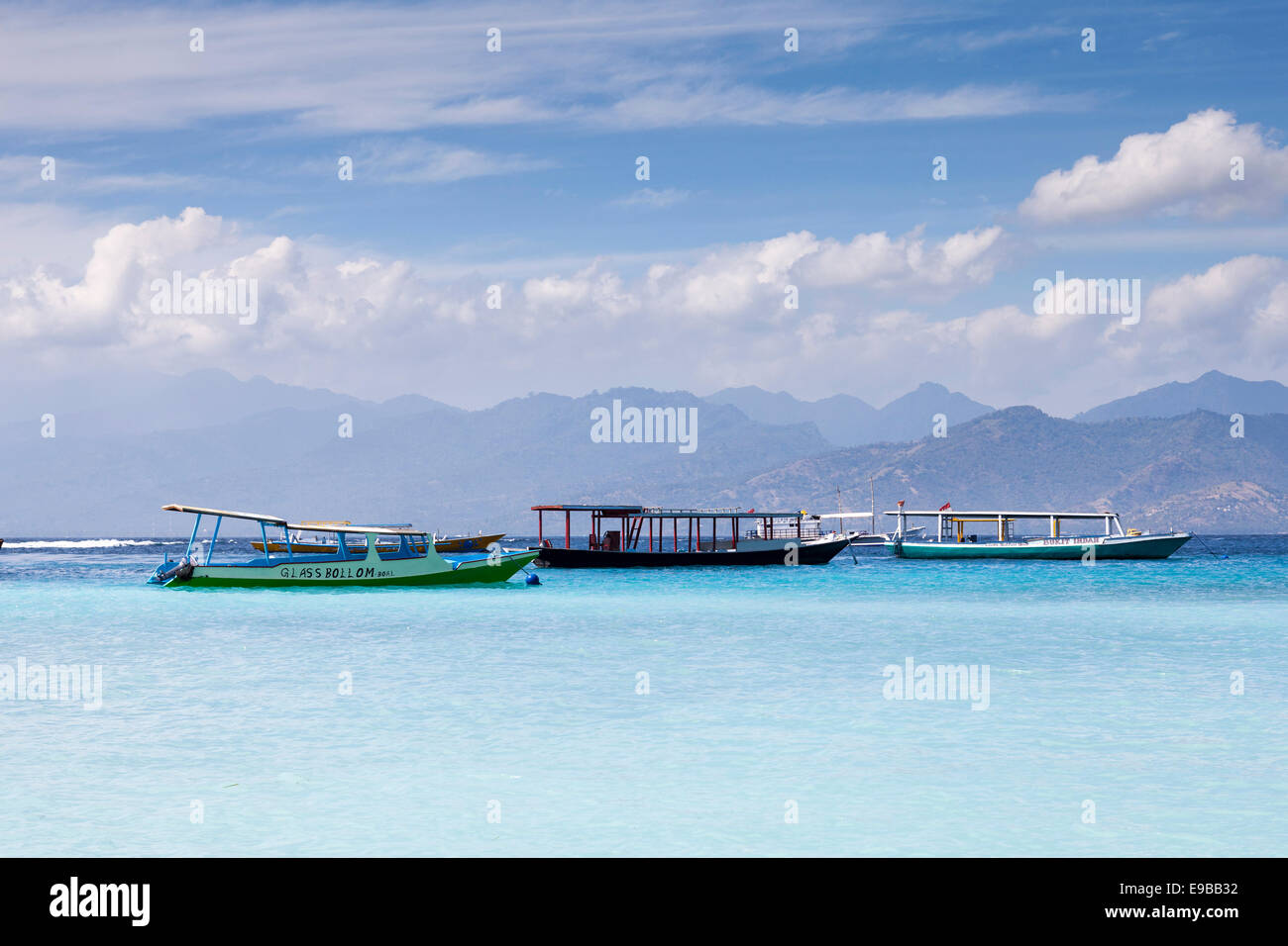 Boats on blue sea, 'Gili Trawangan', 'Gili Islands', Lombok, Indonesia Stock Photo