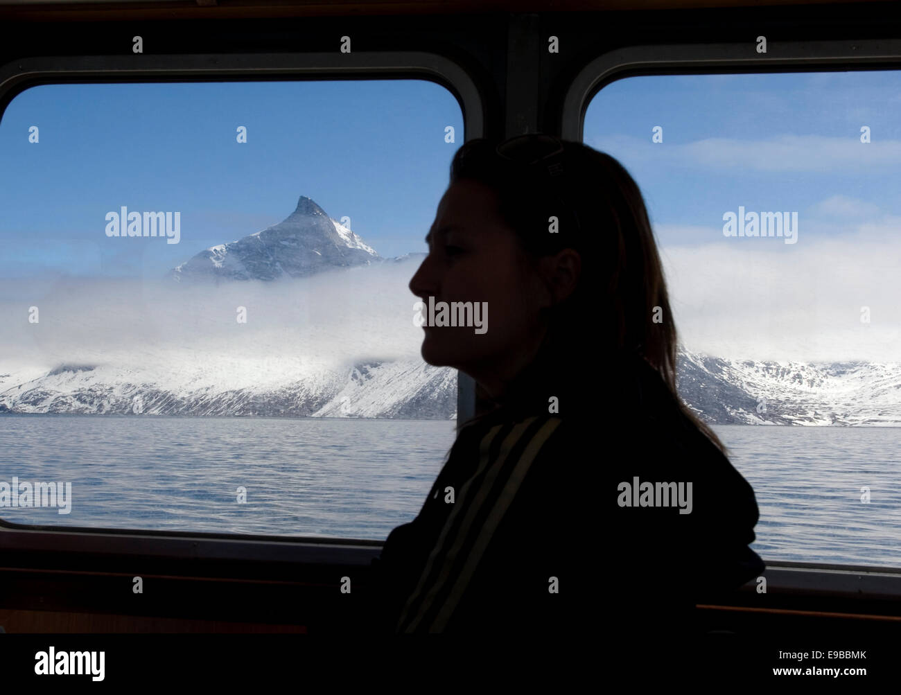Visitor touring waterways near Nuuk, Greenland by boat Stock Photo Alamy
