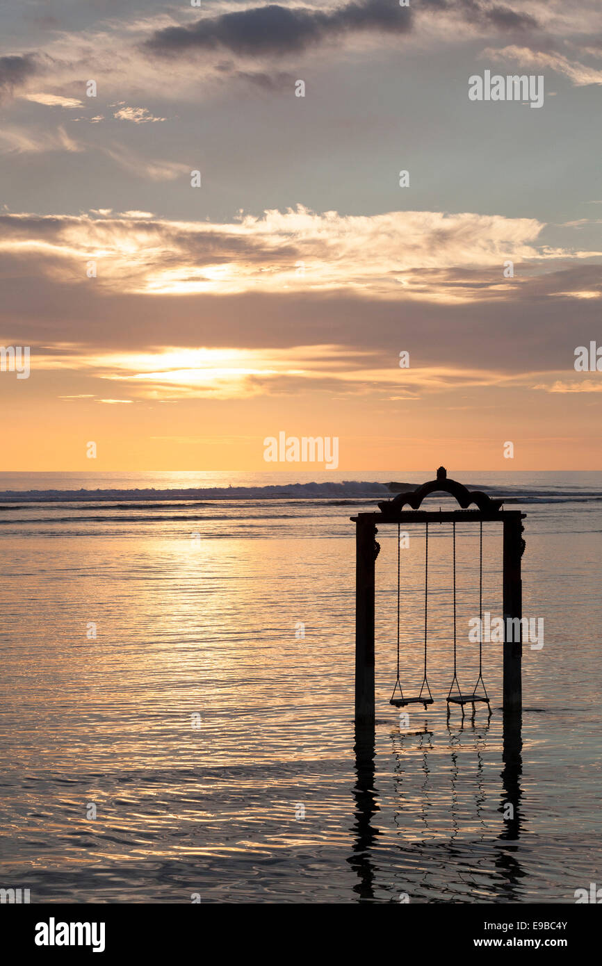 Sea swing at sunset, 'Gili Trawangan', 'Gili Islands', Indonesia Stock Photo