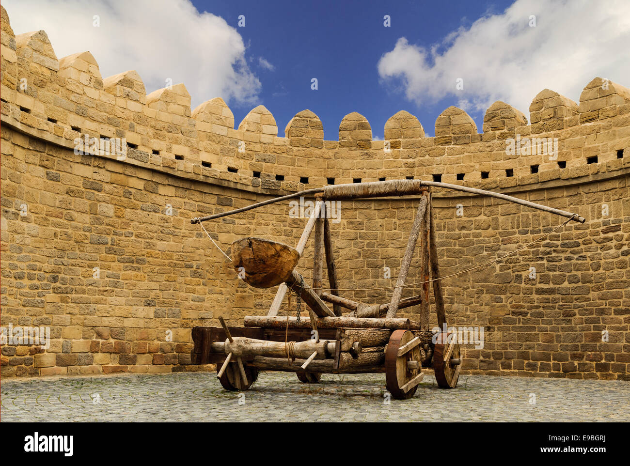 catapult wooden Turkish Mancinik in city wall Icheri Sheher (Old Town) of Baku Azerbaijan Stock Photo