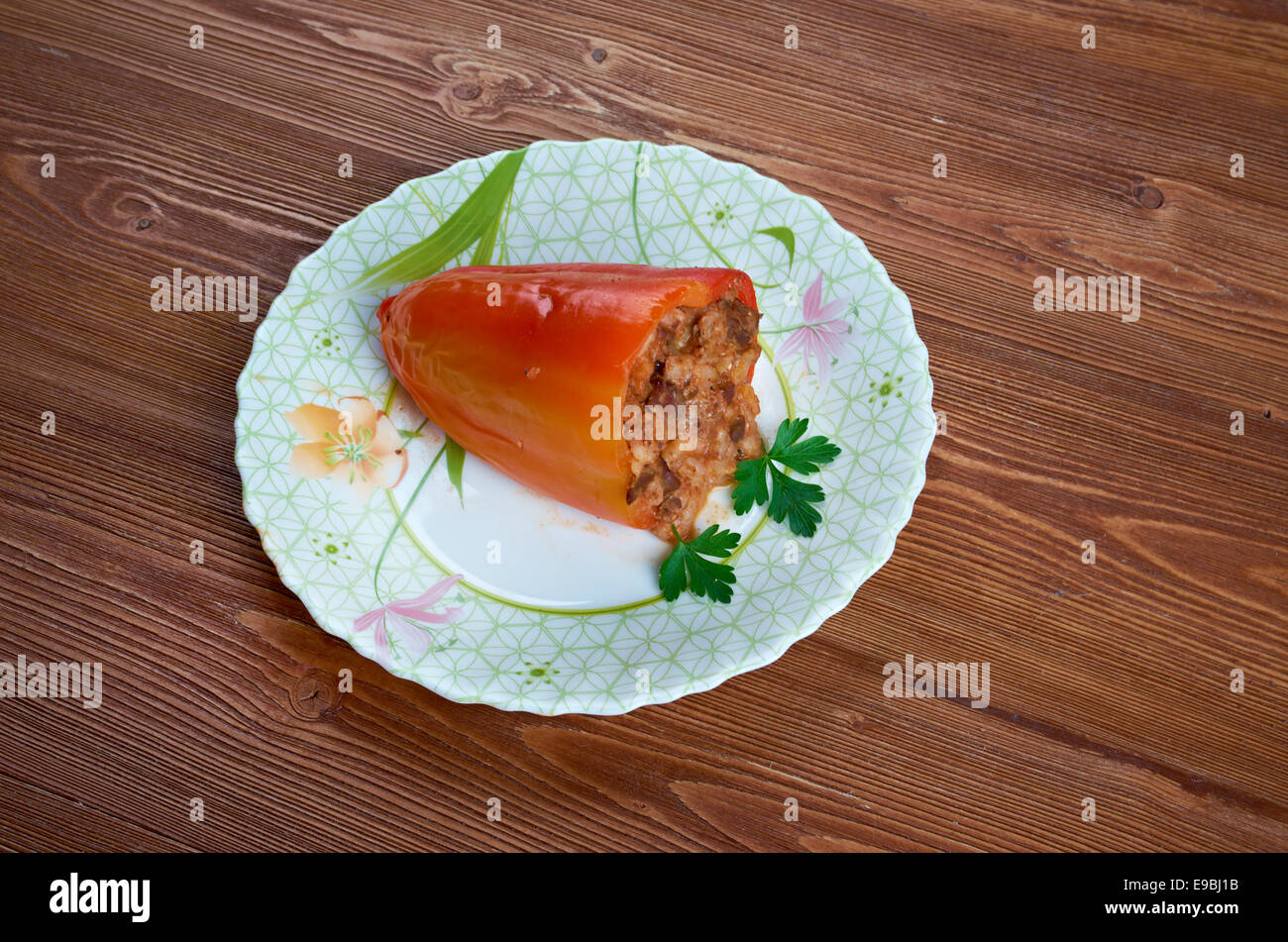 Stuffed paprika with liver, pork, rice and vegetables.Balkan cuisine Stock Photo