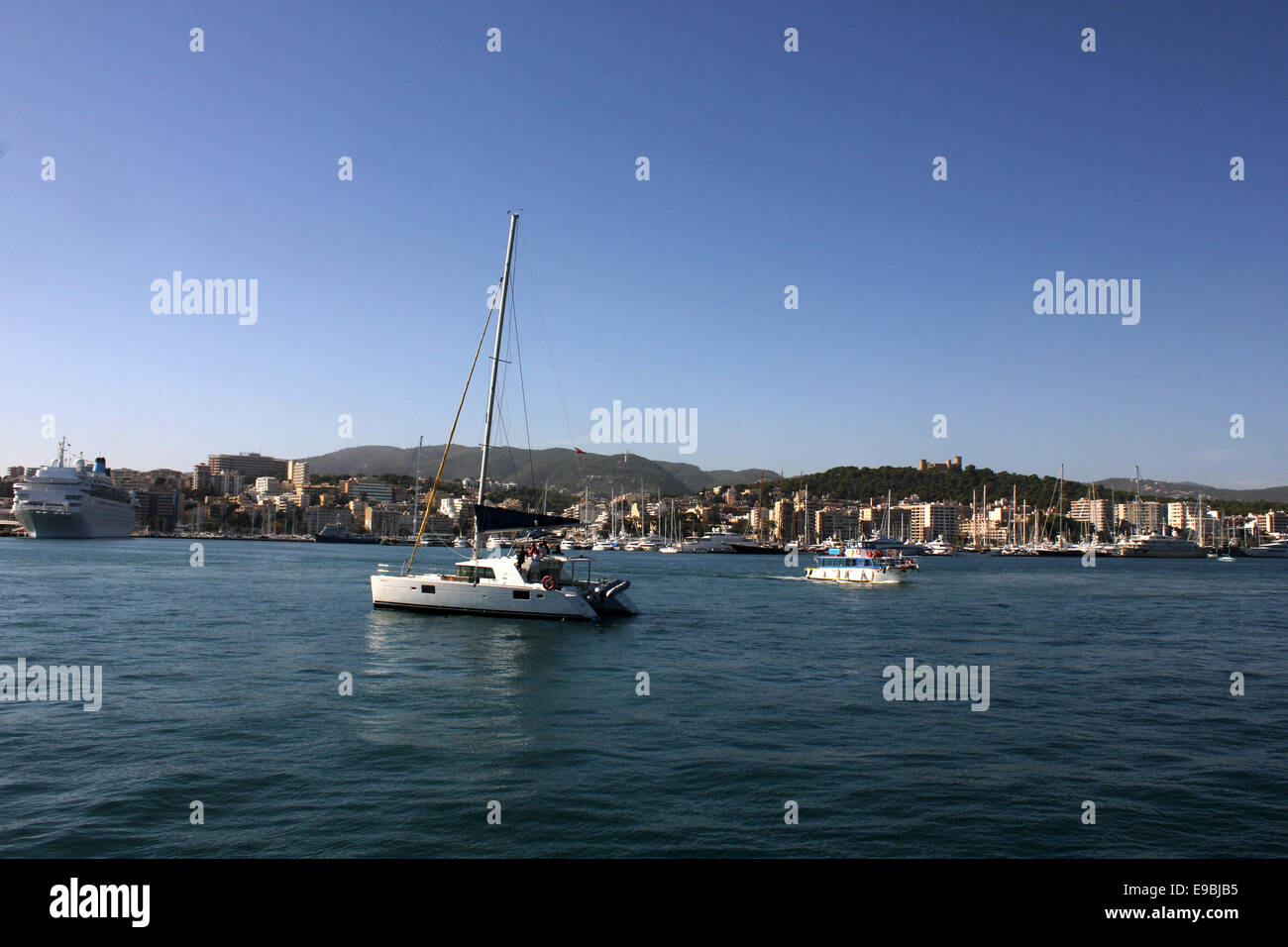 Nautical scene - boats + Paseo Maritimo + Belver Castle - Palma de Mallorca / Majorca, Balearic Islands, Spain. 18th October Stock Photo