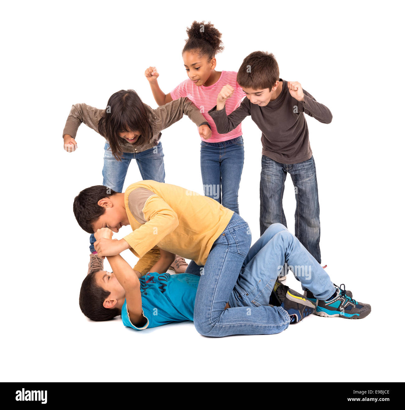 Boys fighting with other kids cheering isolated in white Stock Photo