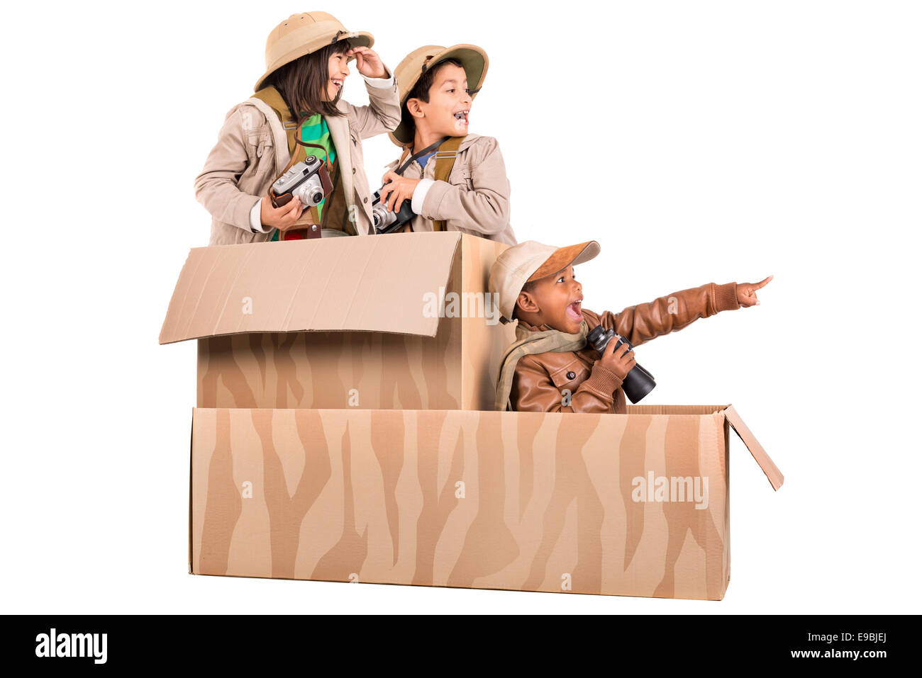 Children's group in a cardboard box playing safari Stock Photo