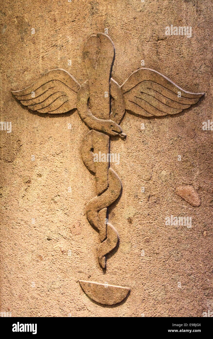 Ancient pharmacy with the symbol of medical caduceus Stock Photo