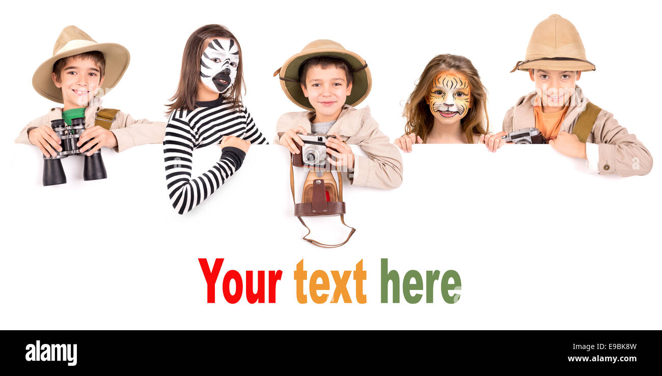 Children's group in safari clothes and face-paint over a white board Stock Photo