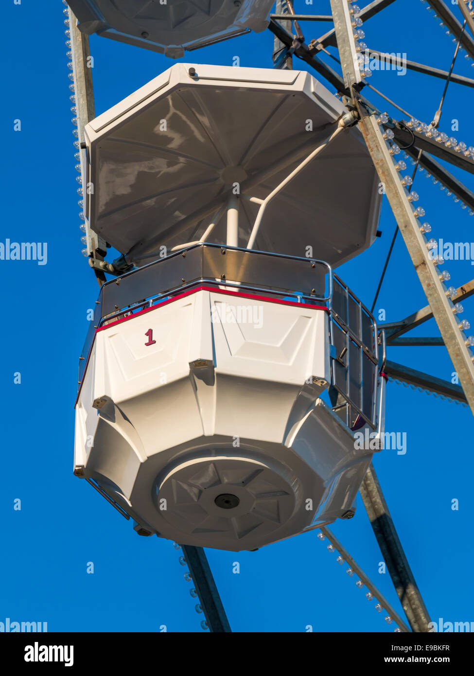 close up white ferris wheel against blue sky Stock Photo - Alamy