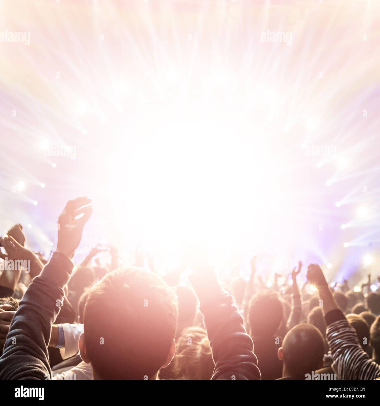 Rock concert, active lifestyle, happy people applauding to pop group ...