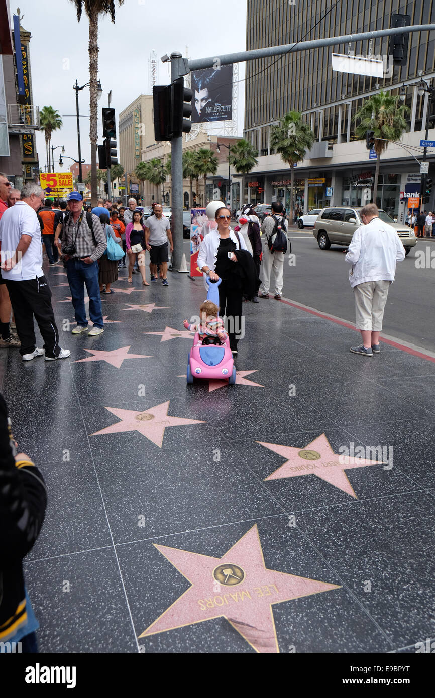 Hollywood Walk of fame and the characters Stock Photo - Alamy