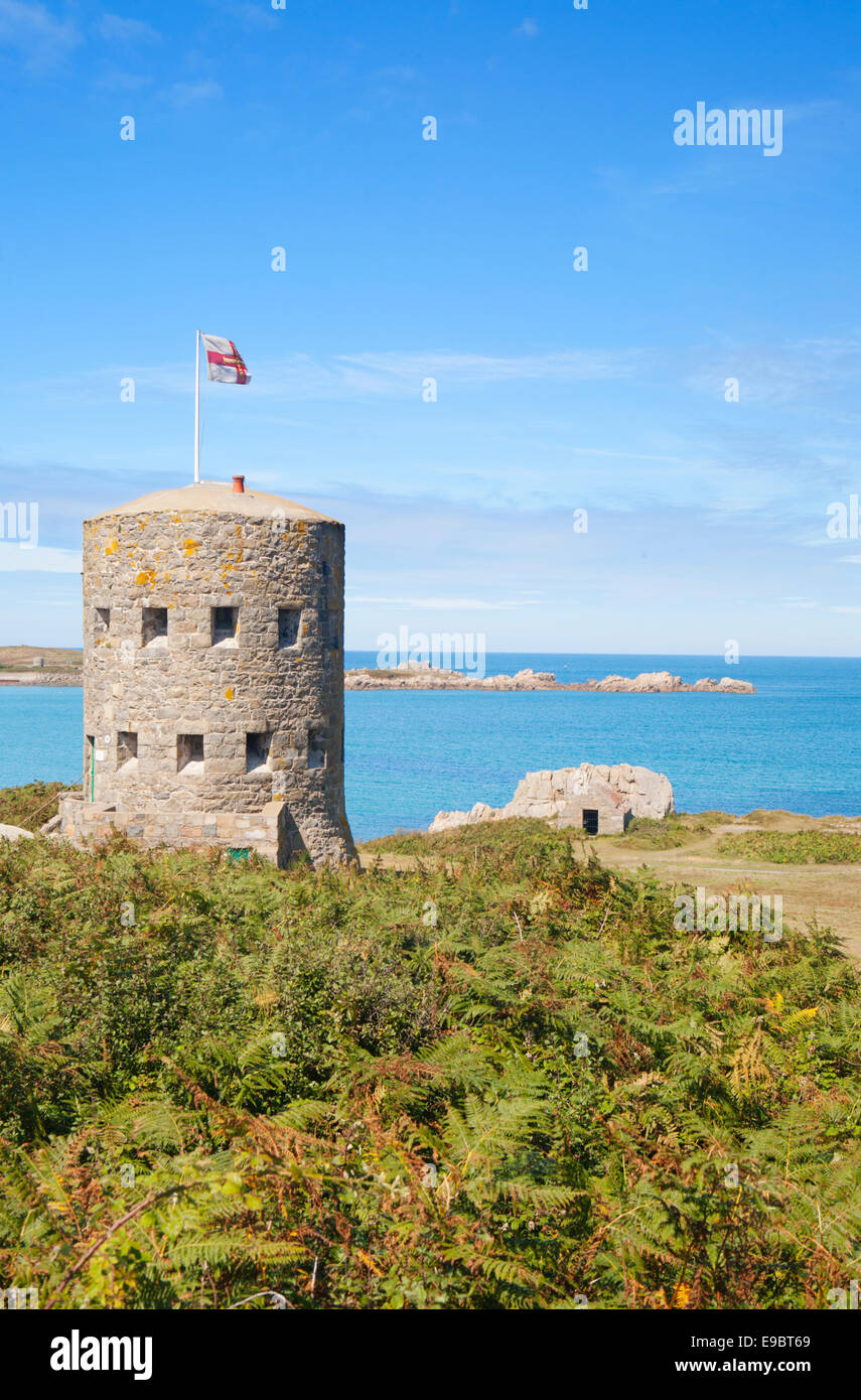 L'ANCRESSE BAY AND MARTELLO TOWER Stock Photo