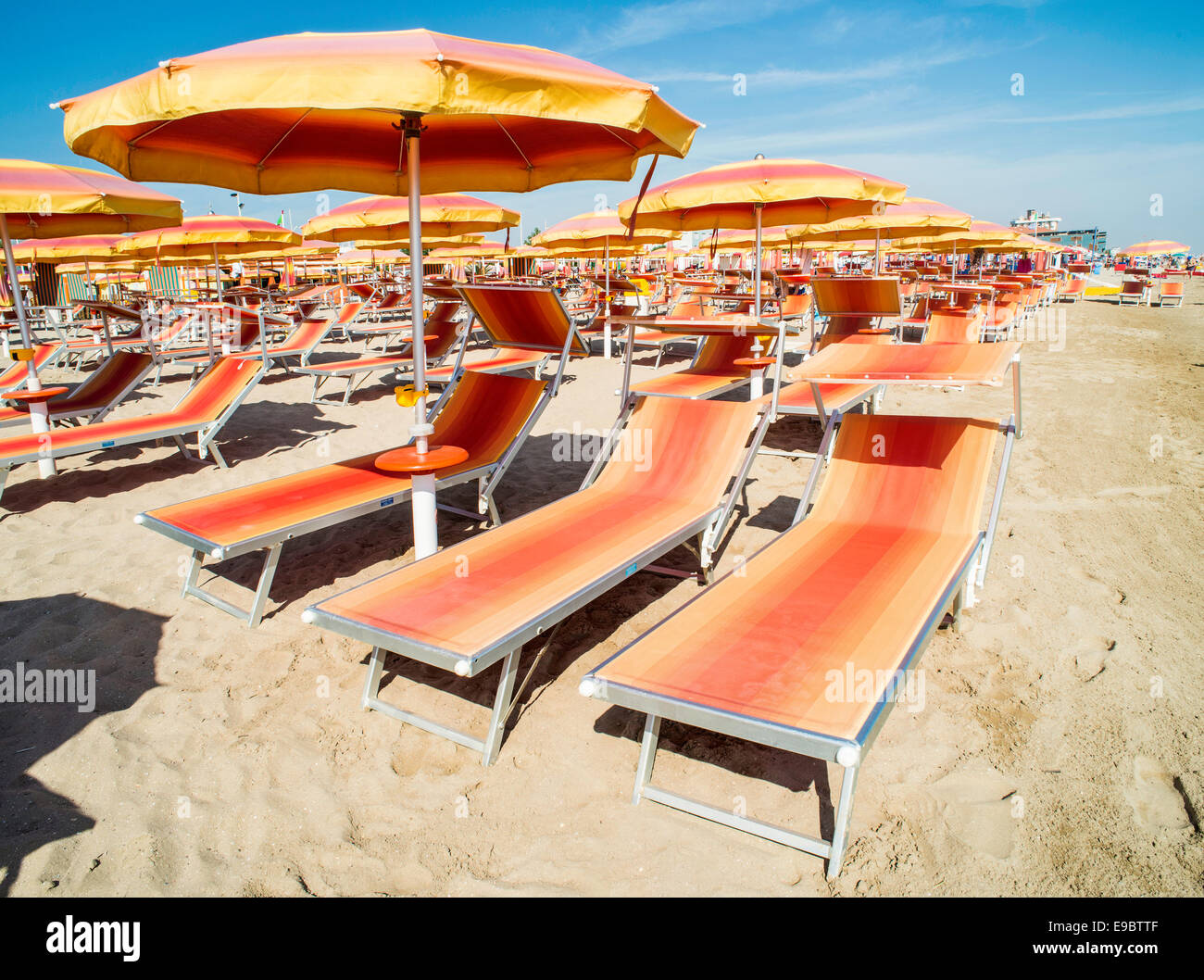 Orange sunbeds and umbrellas on the beach Stock Photo Alamy