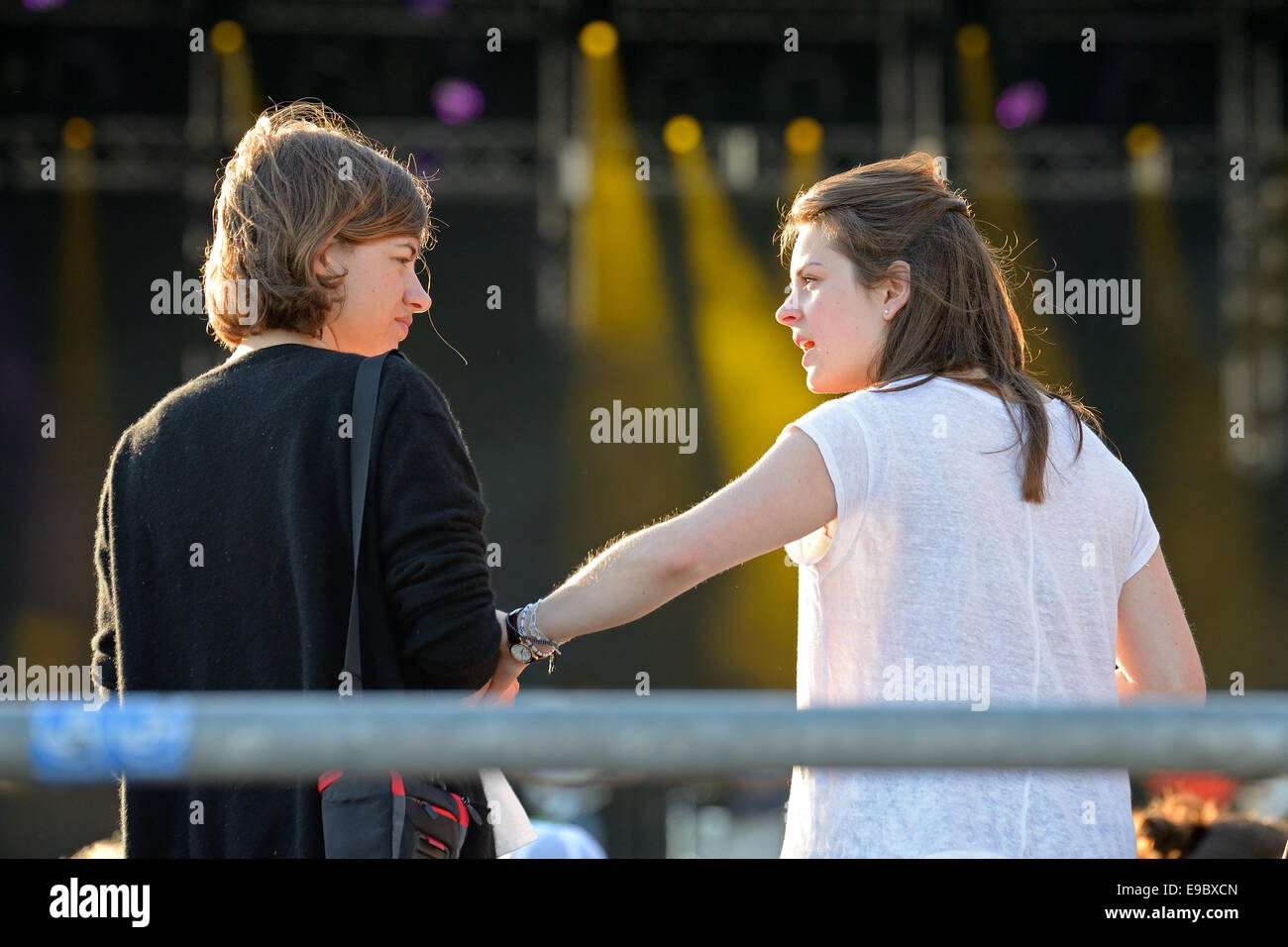 BARCELONA - MAY 28: Women talk during a concert at Heineken Primavera Sound 2014 Festival (PS14). Stock Photo