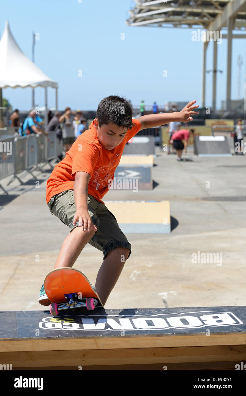 BARCELONA - JUN 28: A kid in the junior skateboard competition at LKXA Extreme Sports Barcelona Games. Stock Photo
