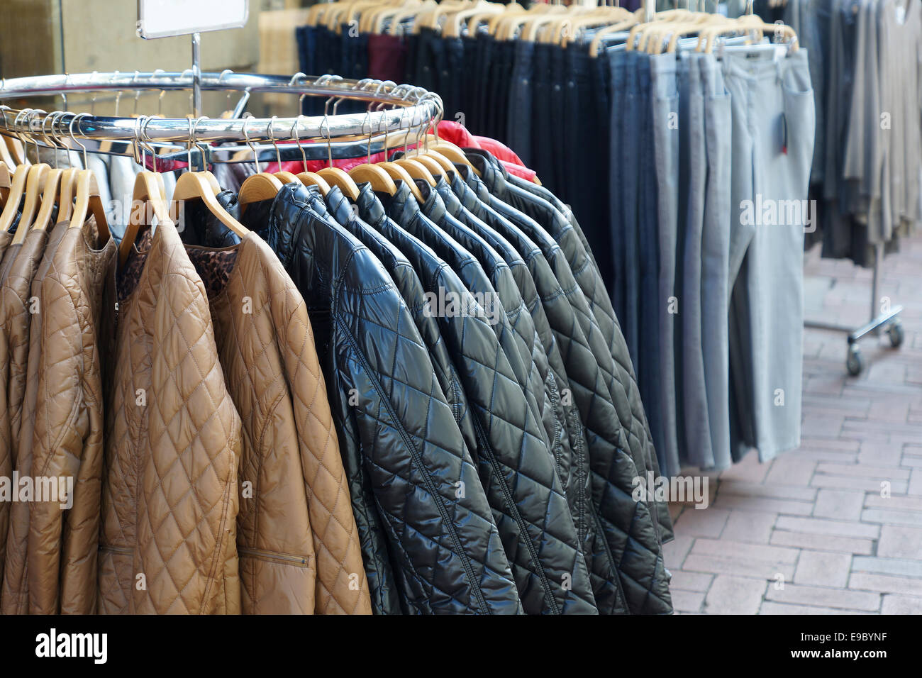 quilted jackets and jeans for sale Stock Photo