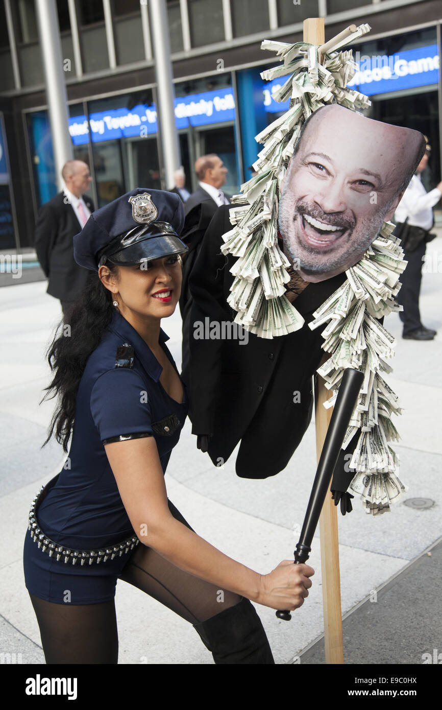 Performance artist Marni at with effigy of Lloyd Blanfein, CEO of Goldman Sachs at a demonstration during World Business Roundtable in NYC. Stock Photo