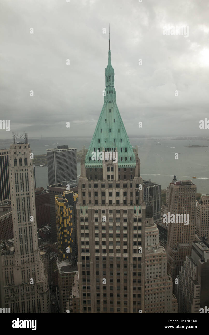 Top of the Woolworth Building with a stormy NY Harbor behind. Stock Photo