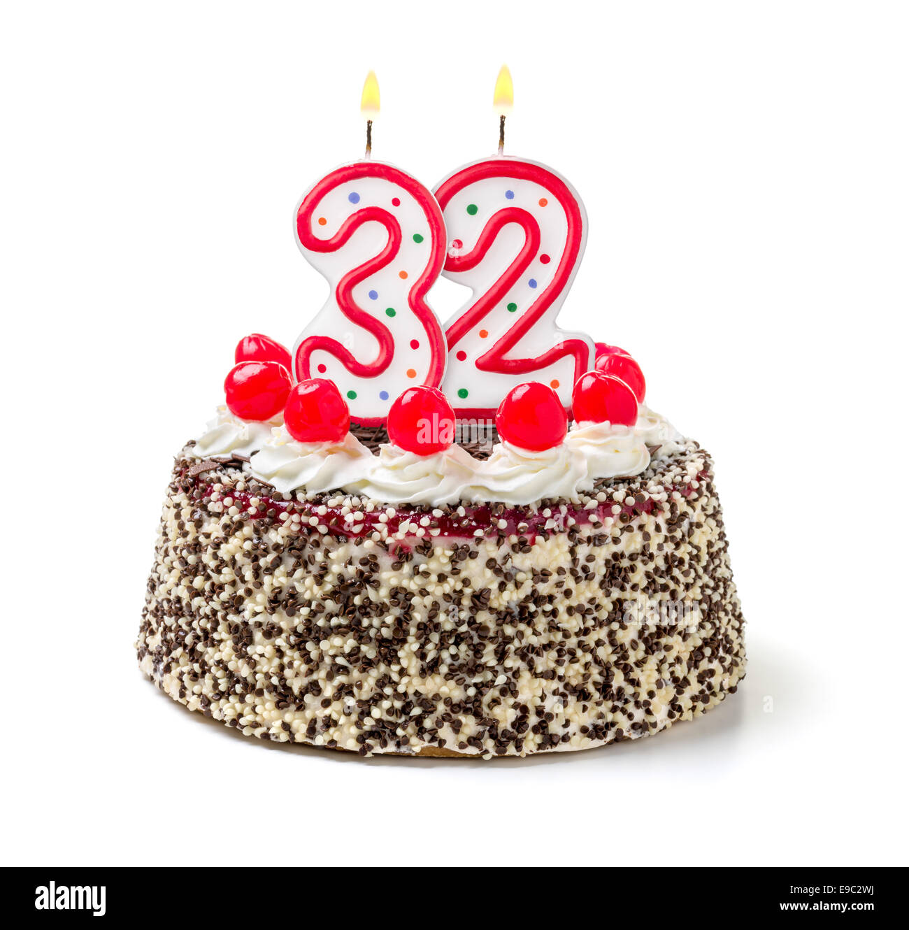 Birthday cake with burning candle number 32 Stock Photo