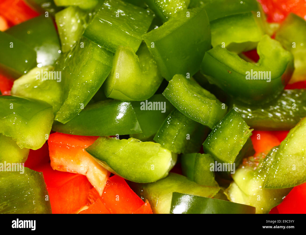 Chopped red and green peppers Stock Photo - Alamy