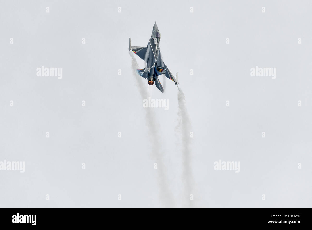 A General Dynamics F-16A Fighting Falcon Military Jet Fighter of 350 Squadron Belgium Air Force puts on an impressive display. Stock Photo