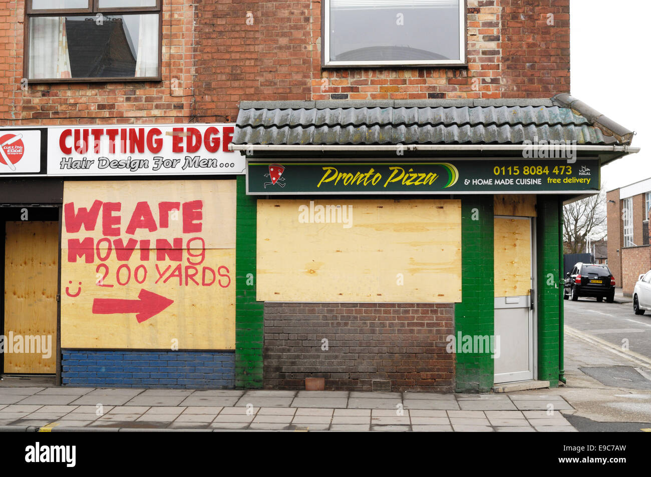 Boarded up shops in Beeston, Nottingham, England. Stock Photo