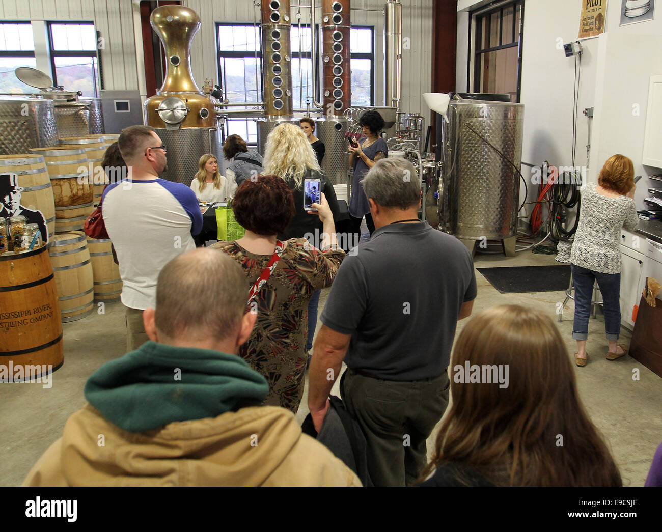 Le Caire, Iowa, USA. 23rd Oct, 2014. Danielle Colby Cushman of American Pickers fame greets fans and unveils Dannie Diesel's American Whiskey at the Mississippi River Distilling Company in Le Claire, Iowa Thursday October 24, 2014. Credit:  Kevin E. Schmidt/ZUMA Wire/Alamy Live News Stock Photo