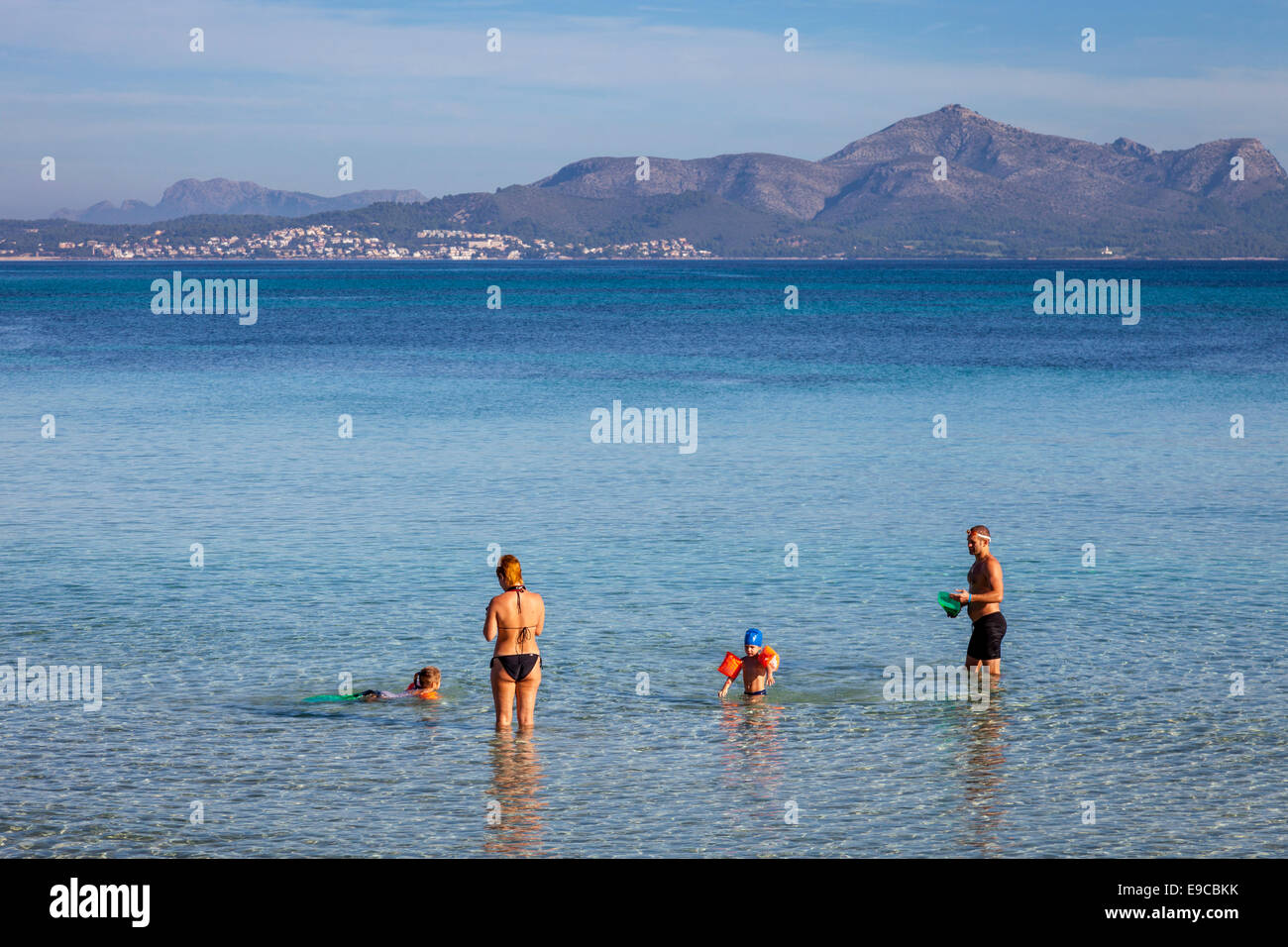 Family Playing In The Sea, Ca'n Picafort, Mallorca - Spain Stock Photo
