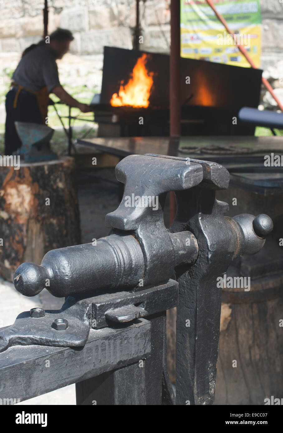 Vise and anvil in a forge shop. Blacksmith tools Stock Photo
