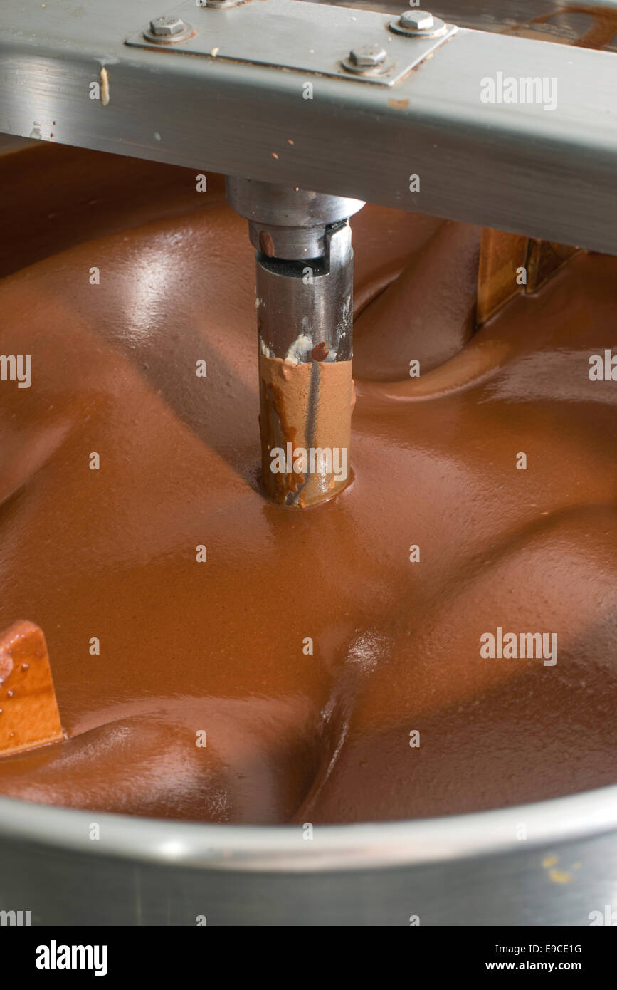 Machine for mixing chocolate. Close up Stock Photo