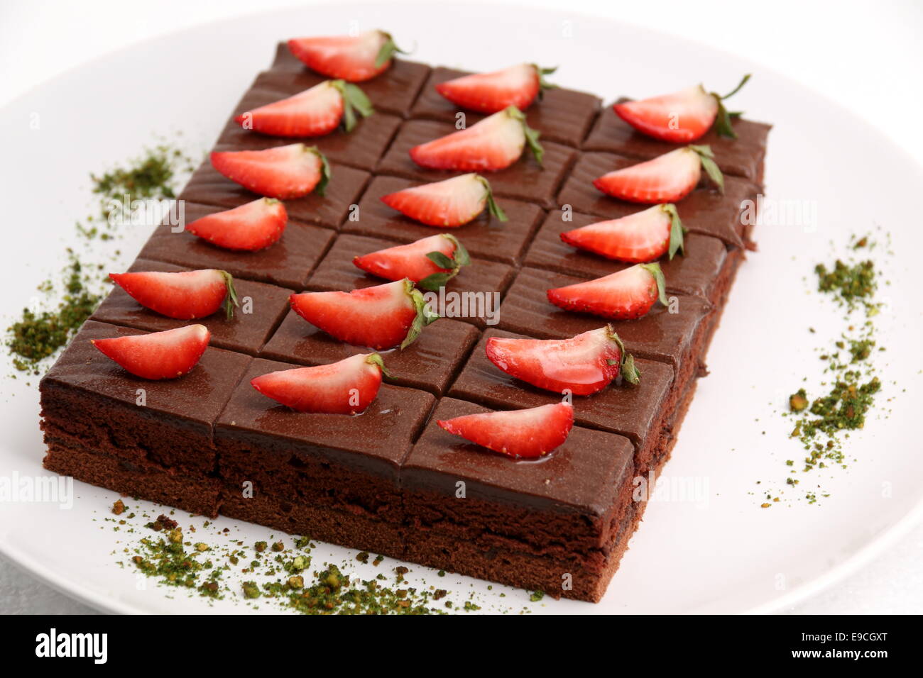 A piece of chocolate cake with strawberry Stock Photo - Alamy