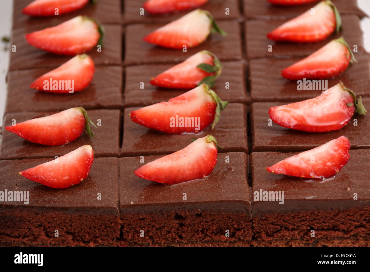 A piece of chocolate cake with strawberry Stock Photo - Alamy
