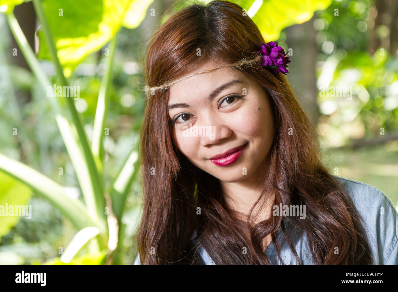 Pinoy woman in a green garden on farm Stock Photo - Alamy