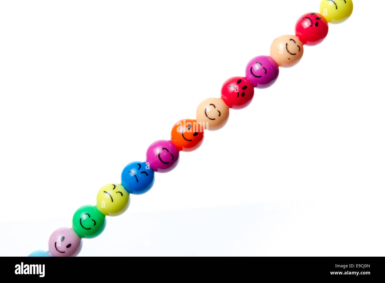 Smiley faces with various expressions on a pen Stock Photo