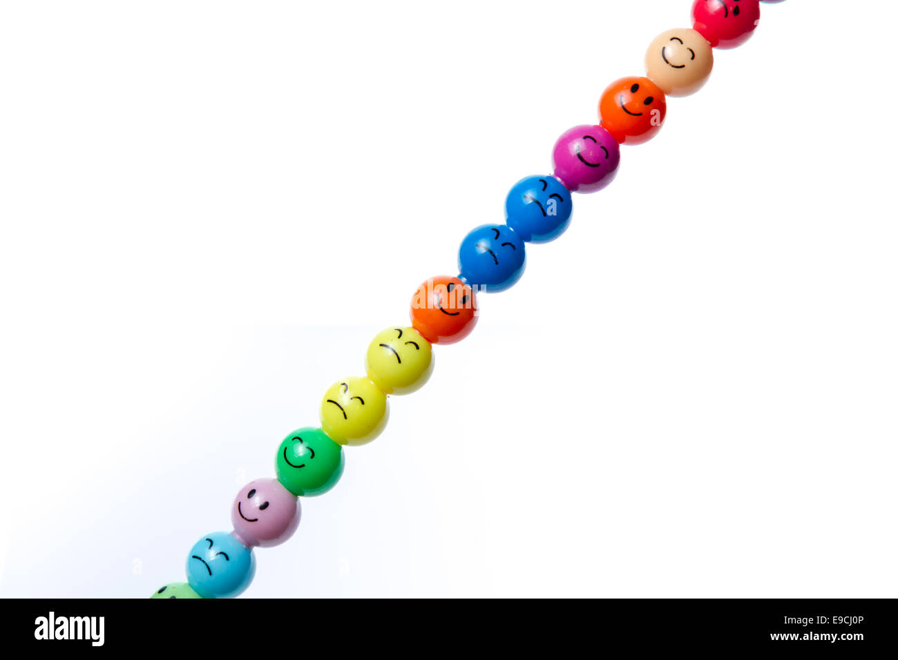 Smiley faces with various expressions on a pen Stock Photo