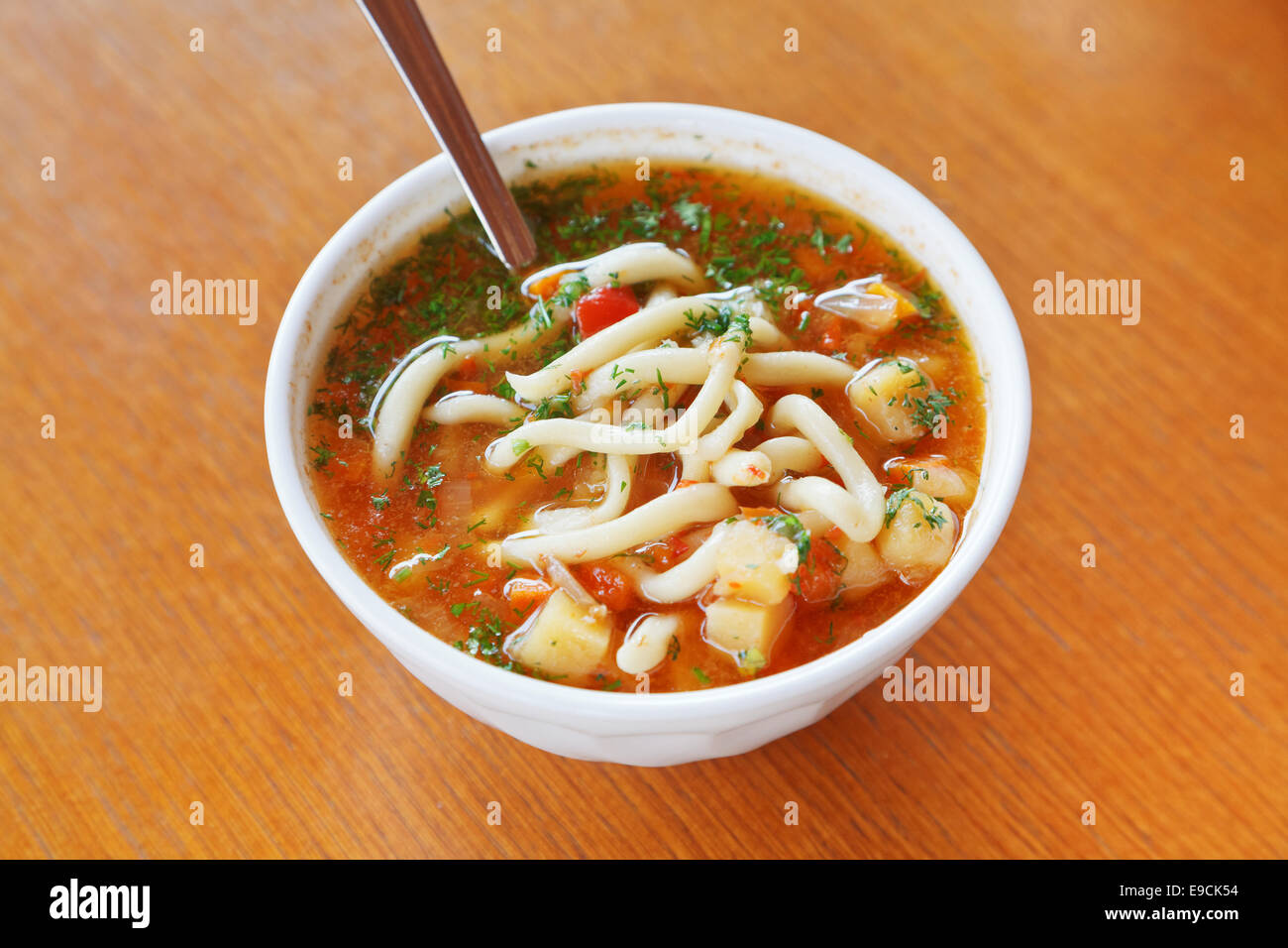 Crimean tatar cuisine - laghman soup in white bowl Stock Photo