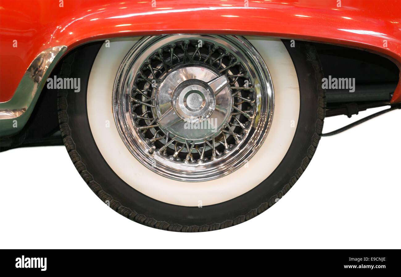 Close Up of Whitewall Tire of Red Classic Car on White Background Stock Photo