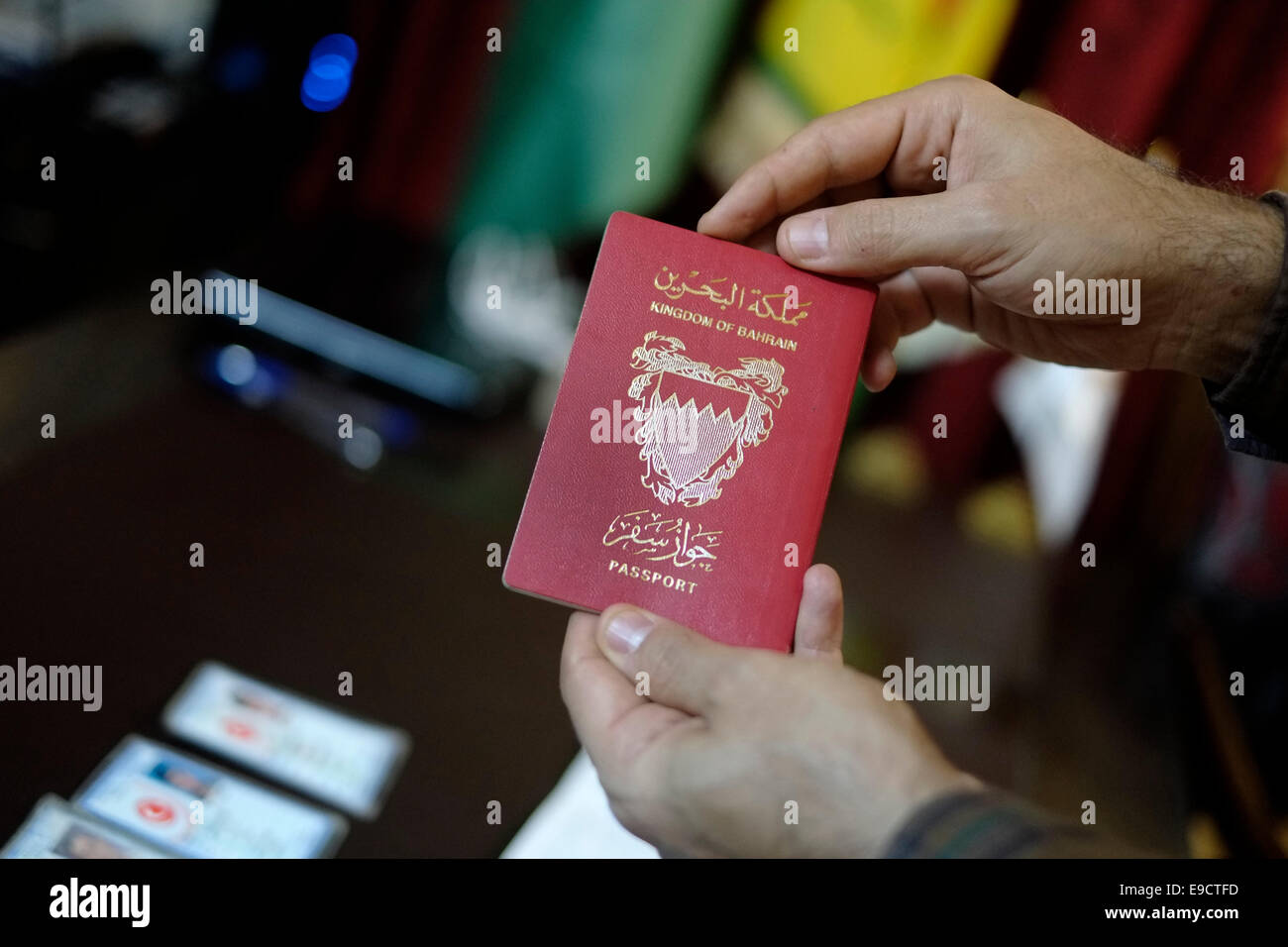 A Bahrain passport found on the body of ISIS or ISIL fighter displayed