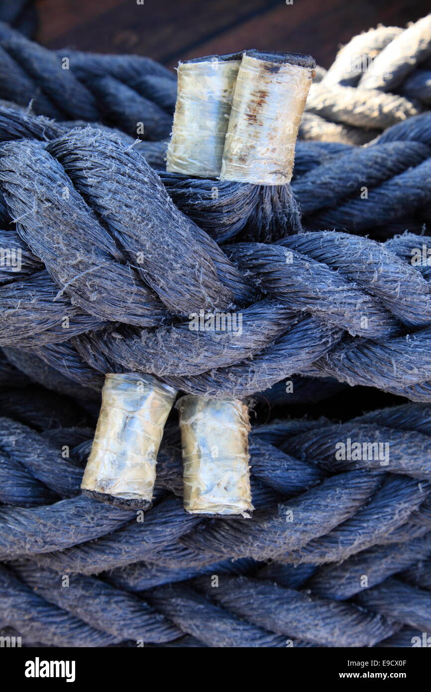 Coiled ropes on a tall ship Stock Photo - Alamy