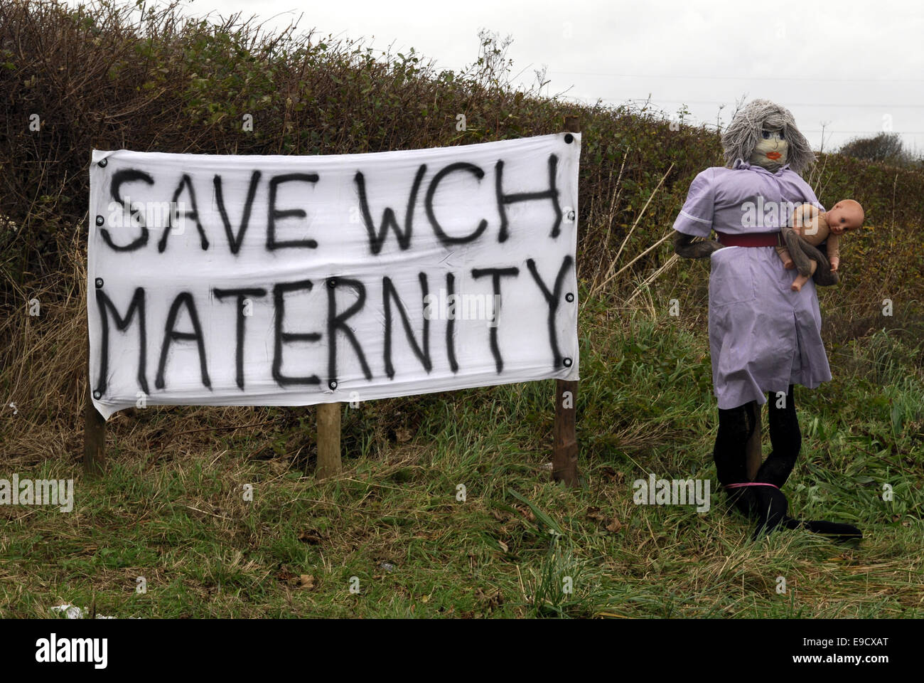 A Shot Of A Protest Banner And Nurse Dummy For Save West
