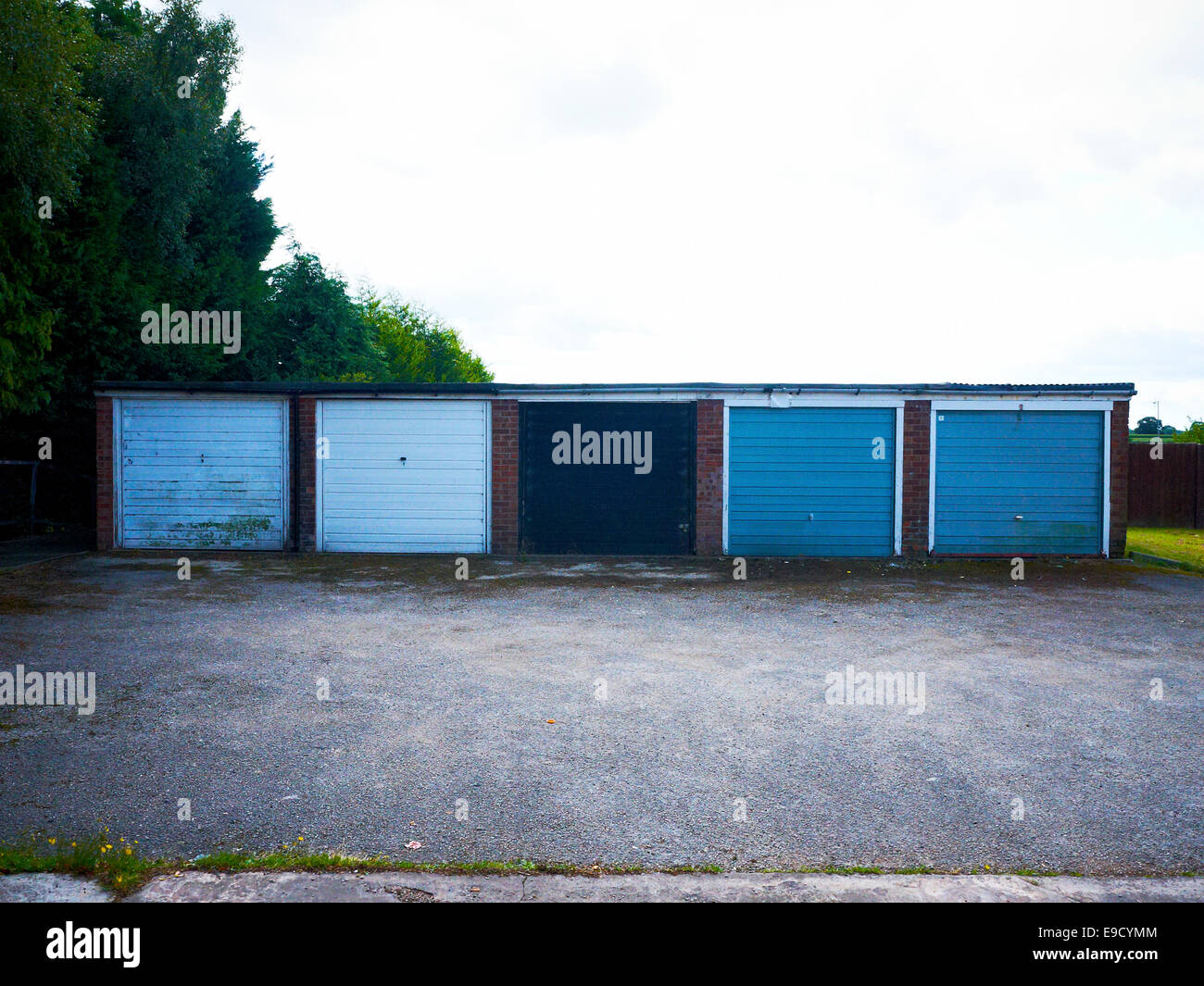 Row of abandoned garages in Cheshire UK Stock Photo - Alamy