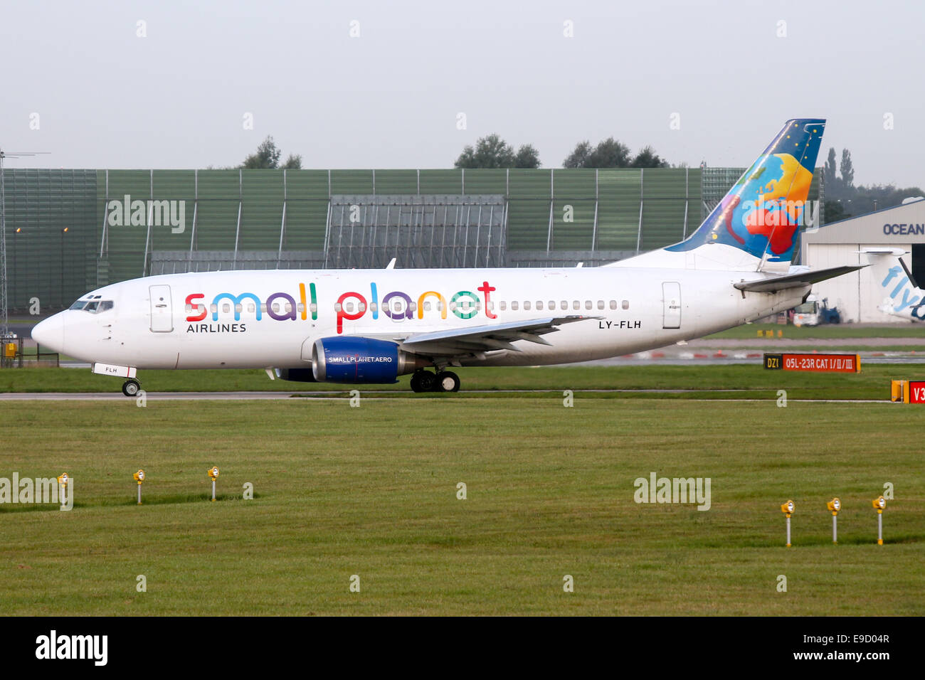 Small Planet Boeing 737-300 taxis to runway 23L at Manchester airport. Stock Photo