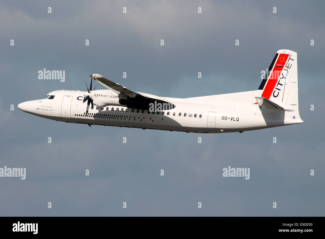 CityJet Fokker 50 climbs away from runway 23R at Manchester airport. Stock Photo