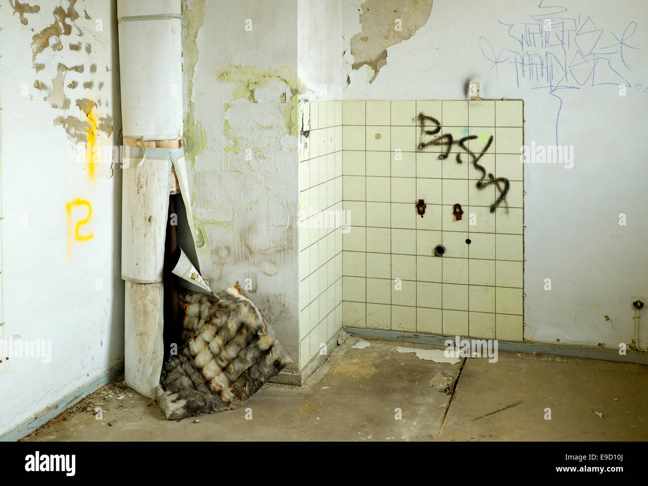 empty room in an old destroyed factory building Stock Photo