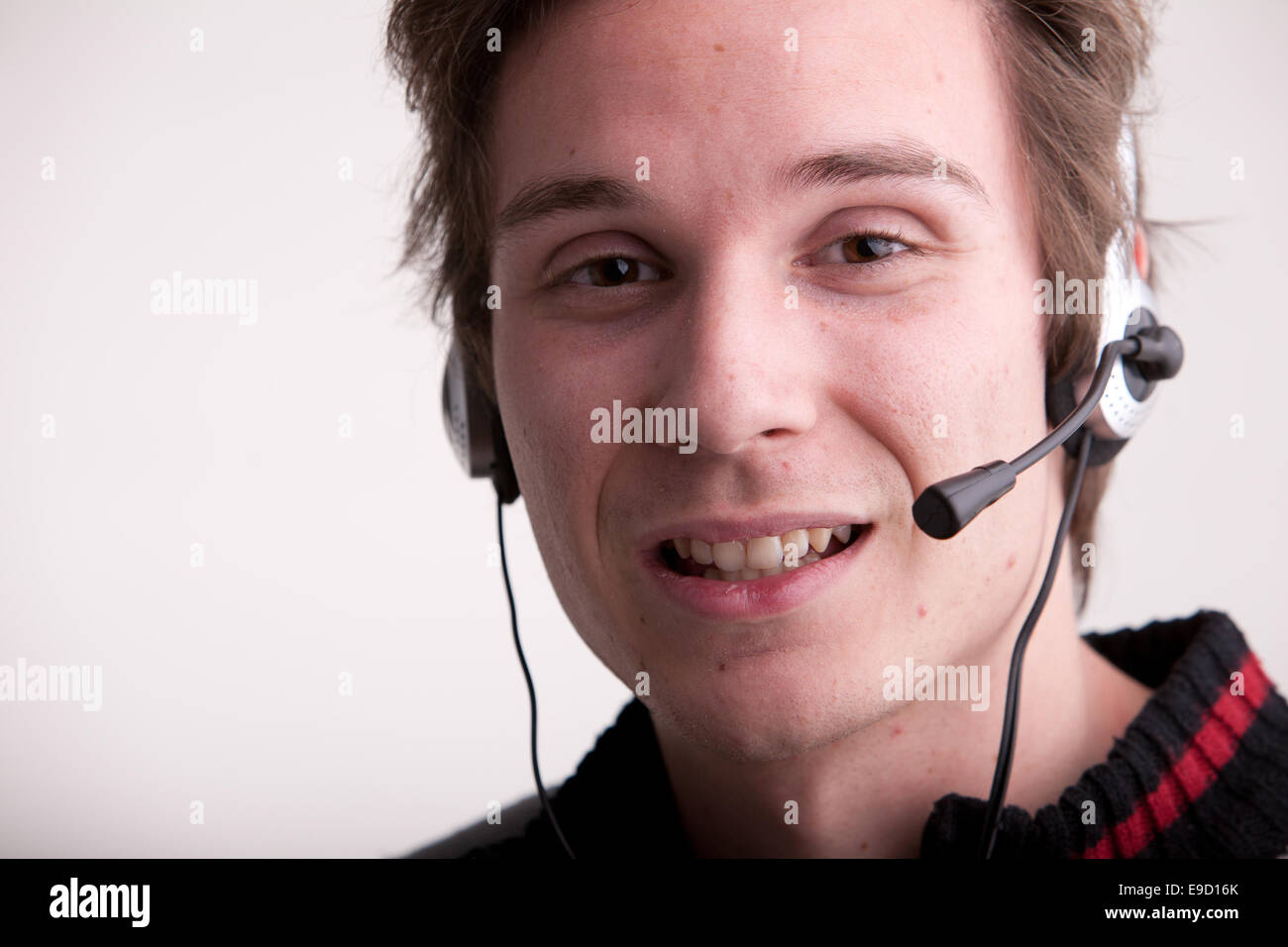 call center young man with a headset Stock Photo