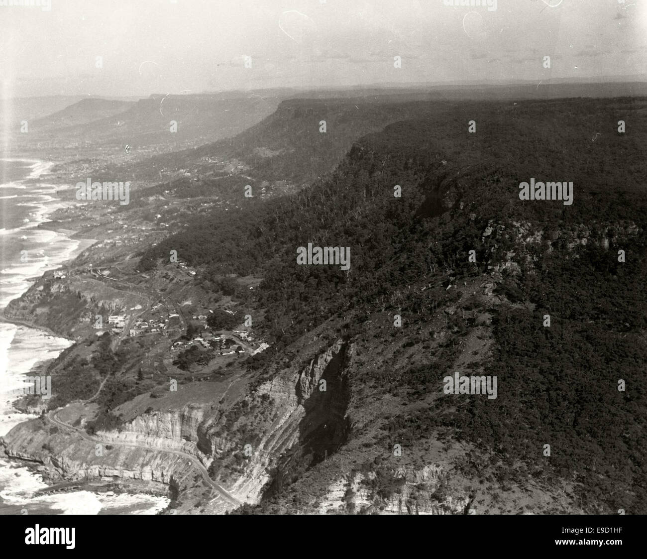 This 1936 aerial photograph from the Adastra Aerial Survey Collection shows soil erosion in Stanwell Park along the South Coast Road. The image documents the environmental impact in the region during that time. Stock Photo