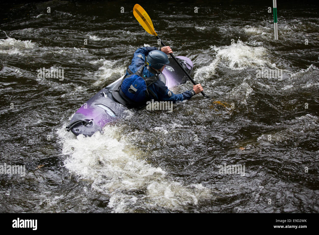 Llandysul, Wales, UK. 25th Oct, 2014. Hundreds of paddlers gather at Llandysul to enjoy the annual two day Teifi Tour, The Tour comprises six stages along the Teifi River, from Llanfihangel yr Arth, down to Poppit Sands, offering kayakers stretches of white water which suit many levels of ability. Credit:  atgof.co/Alamy Live News Stock Photo