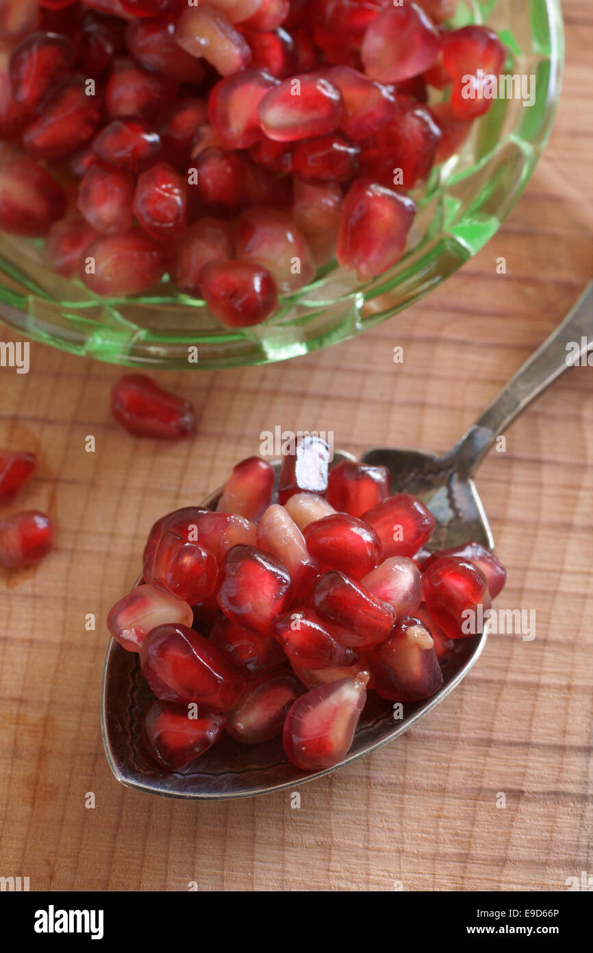 Pomegranate seeds or arils used in cooking, baking garnishes juice blends and beverages Stock Photo