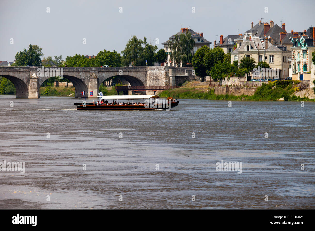 Pleasure boat cruising along the Loire at Saumur Stock Photo