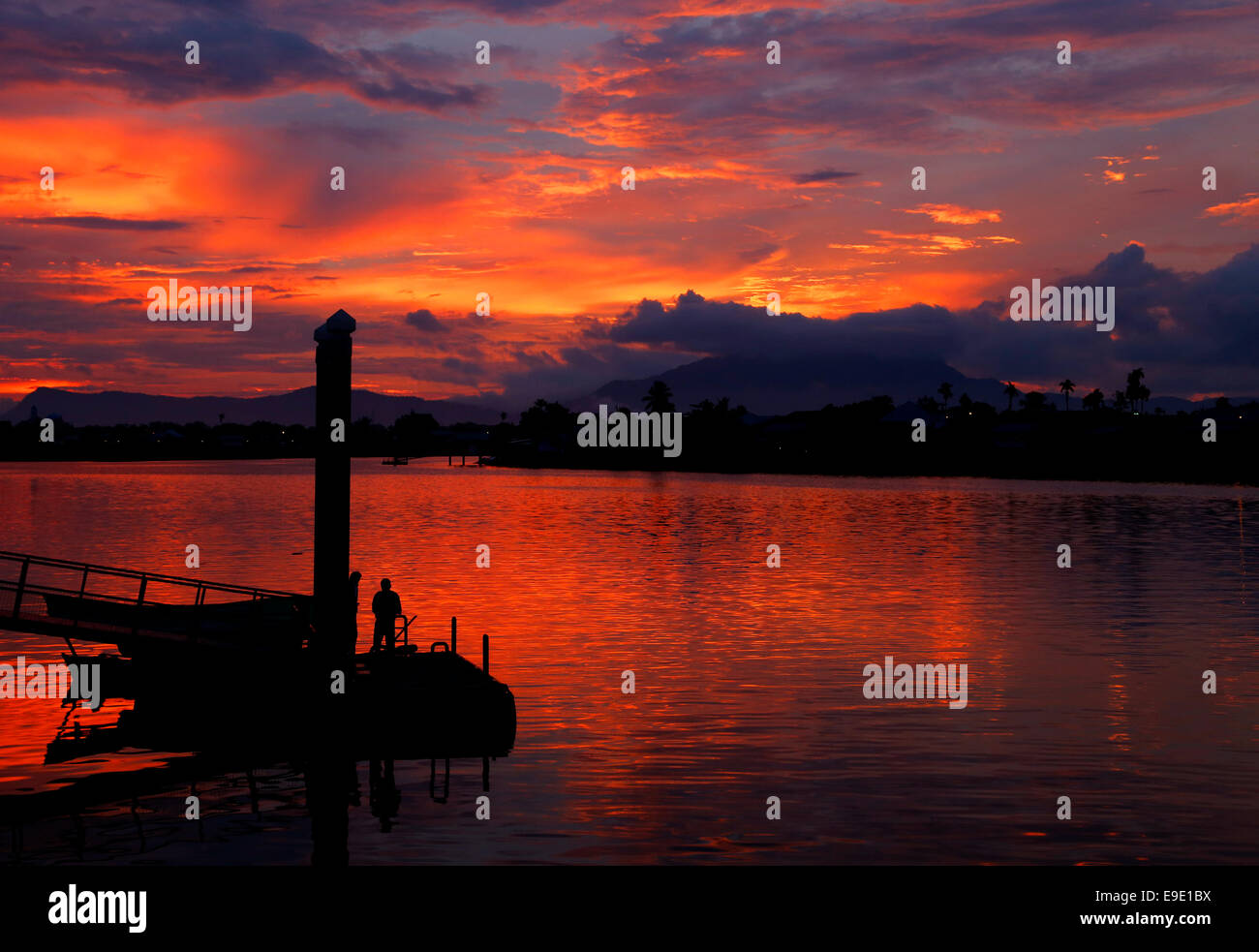 Sunset over the Sarawak River at Kuching, Malaysia Stock Photo