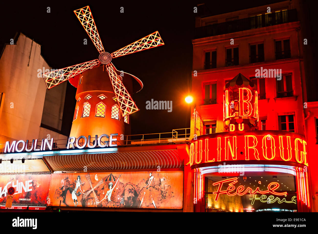 PARIS - DECEMBER 10: The Moulin Rouge by night, on December 10, 2012 in Paris, France. Moulin Rouge is a famous cabaret built in Stock Photo